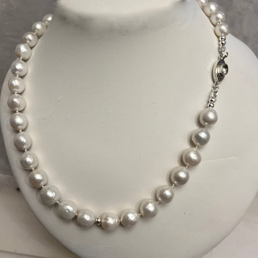 Large white nucleated pearls with sterling silver box clasp