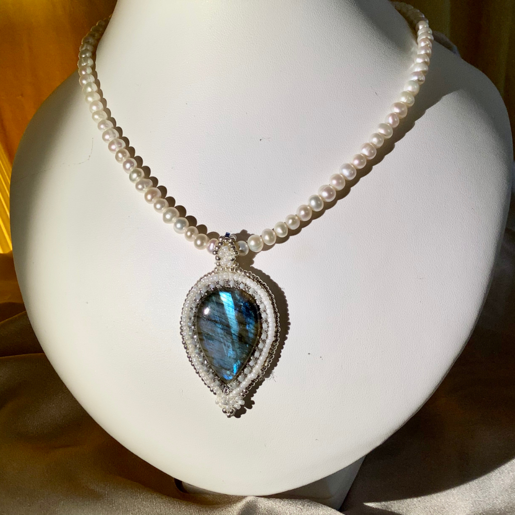 Labradorite pendant with Swarovski crystals on a pearl necklace