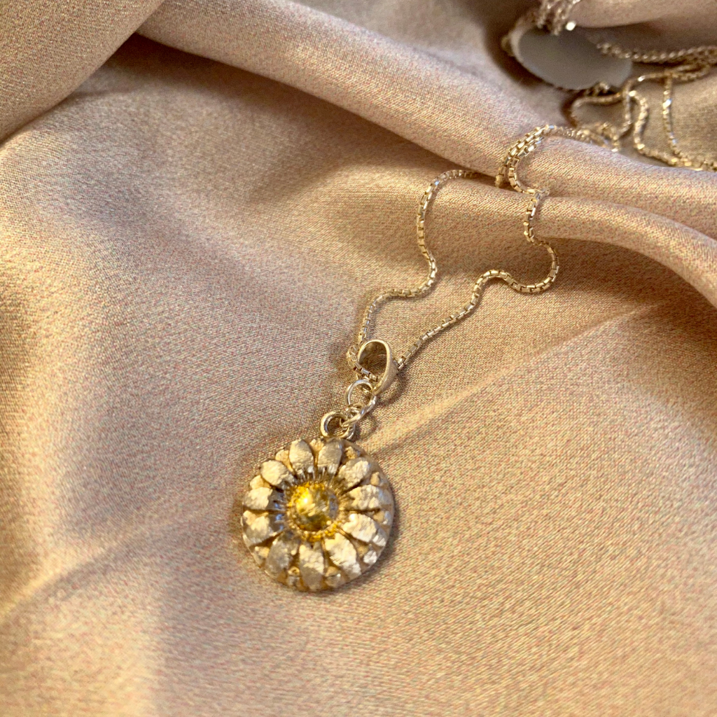 Fine Silver flower (Daisy) pendant with 24kt gold leaf detail